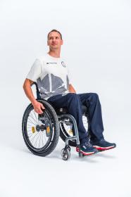 Alpine Pro CAMPION pánské triko z olympijské kolekce zoh 2026 NEUTRÁLNÍ / ZEMITÁ