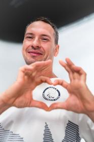 Alpine Pro CAMPION pánské triko z olympijské kolekce zoh 2026 NEUTRÁLNÍ / ZEMITÁ