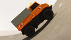 Carson RC auto MB Unimog U406 1:87 oranžová