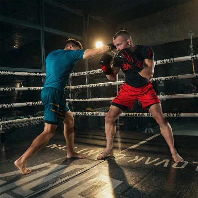 GymBeam Grind Red 2in1 pánské fitness šortky