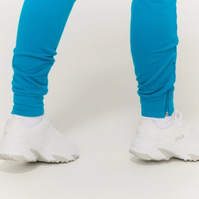 GymBeam Dámské tepláky Limitless Aquamarine