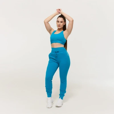 GymBeam Dámské tepláky Limitless Aquamarine