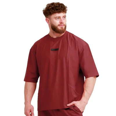 GymBeam Unstoppable Red pánské oversized tričko