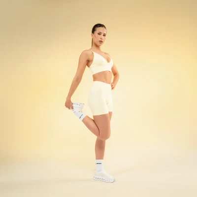 GymBeam Sportovní podprsenka Luma Butter Yellow