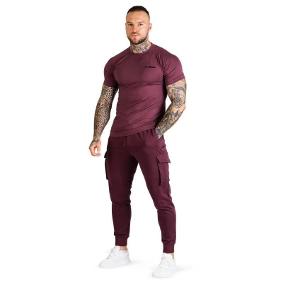 GymBeam Tepláky TRN Eggplant POUZE XL (VÝPRODEJ)