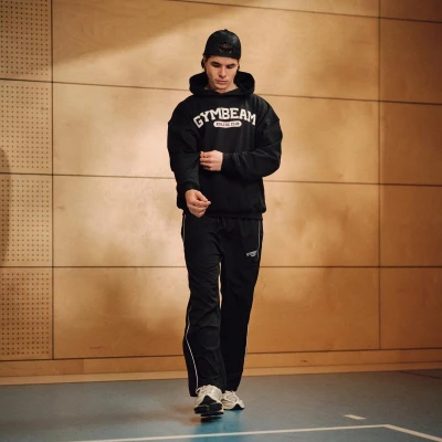 GymBeam Tepláky Varsity Black