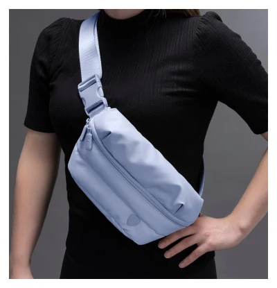 Heys Puffer Mini Waist Bag světle modrá dámská ledvinka