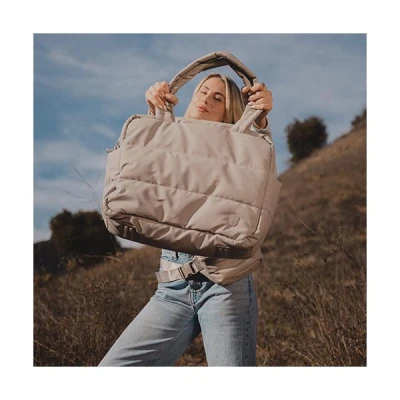 Heys Puffer Personal Bag fialová taška přes rameno