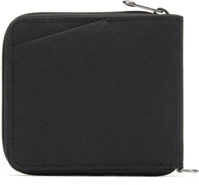 Pacsafe Peněženka RFIDSAFE ZIP AROUND WALLET jet black