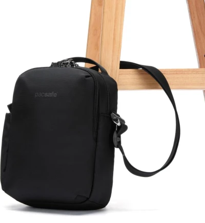 Pacsafe Taška V TOUR CROSSBODY jet black + sleva 400,- na příslušenství