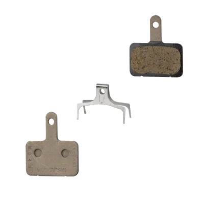 SHIMANO Destičky brzdové SH M05 polymerové, s pružinou SHIMANO Destičky brzdové SH M05 polymerové, s pružinou