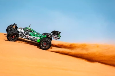 Team Corally Syncro oranžová 2WD 3-4S RTR buggy